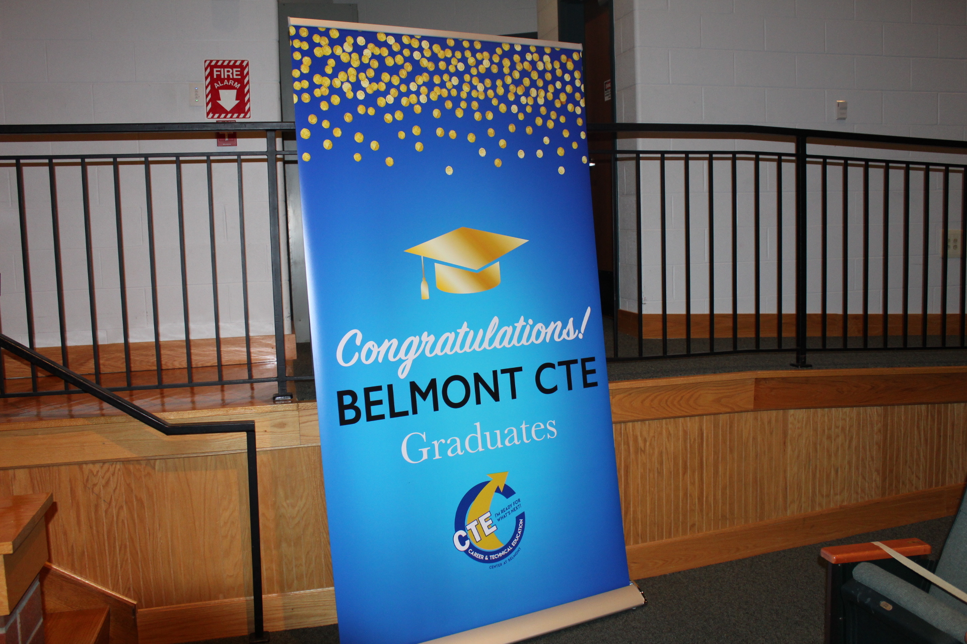 Congratulations Belmont CTE Graduates text on blue field with a gold graduation cap graphic