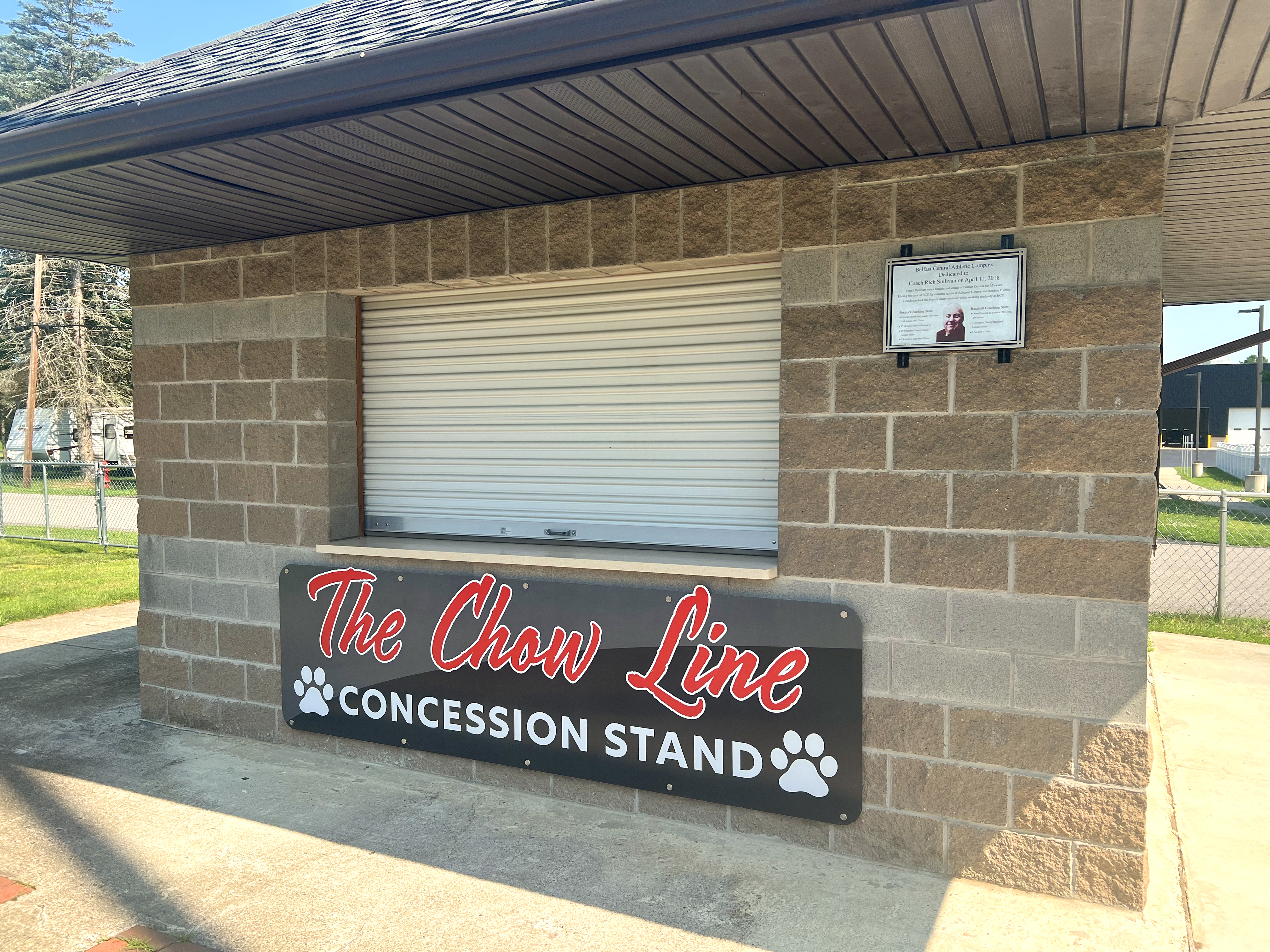 The Chow Line Concession stand text in district colors.