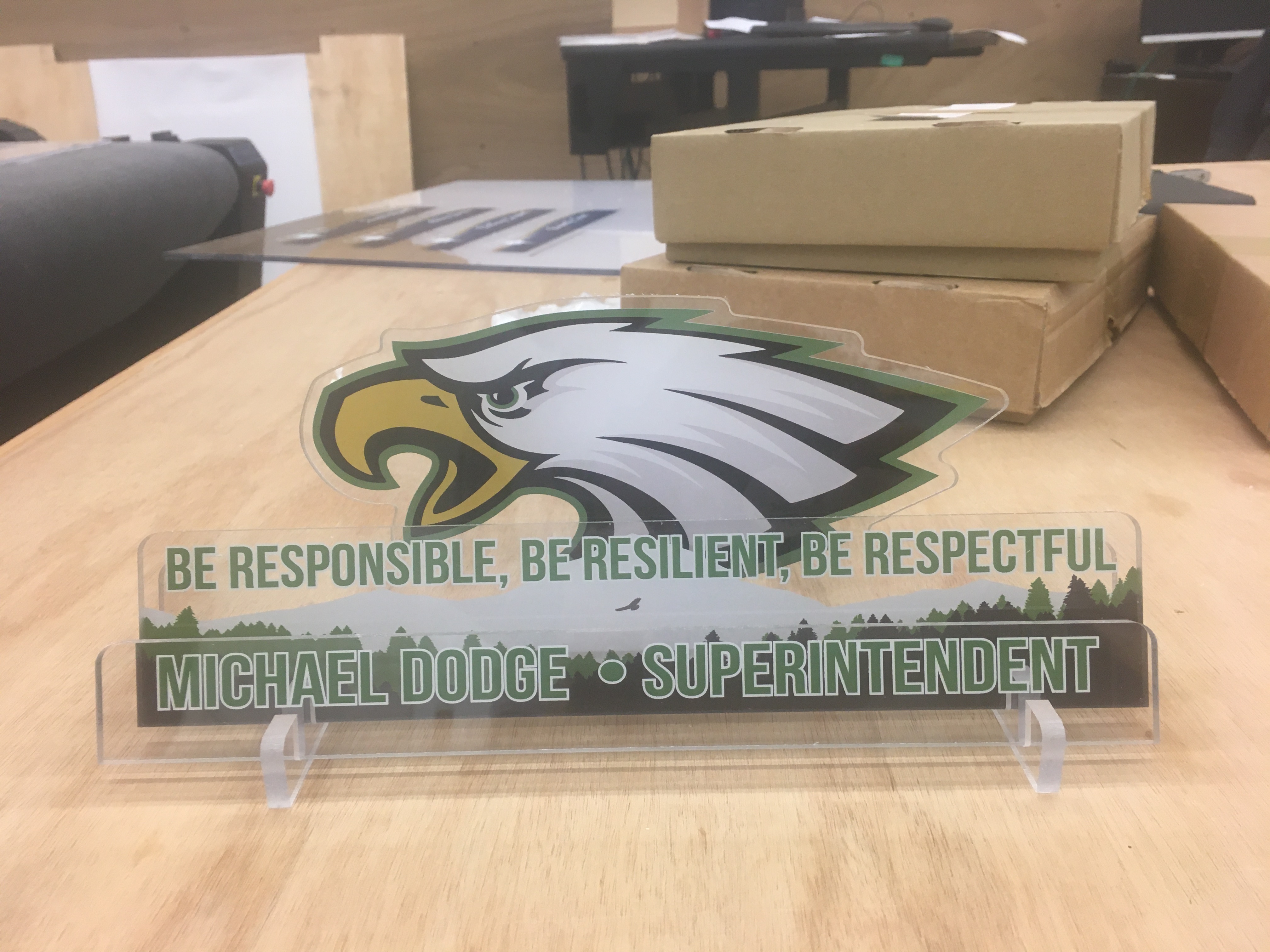 Eagle logo with text saying Be responsible, be resilient, be respectful